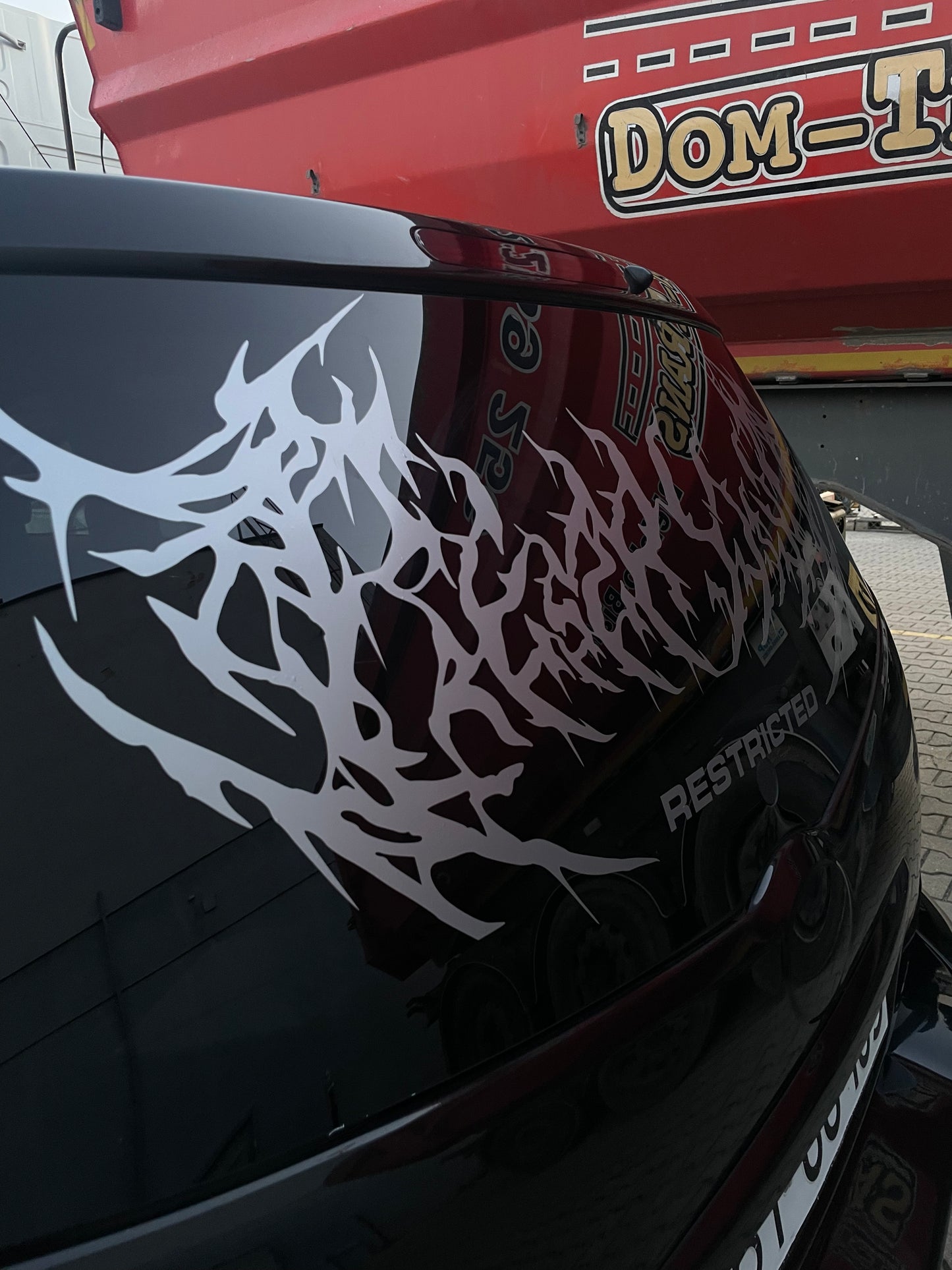 Restricted (metal logo)